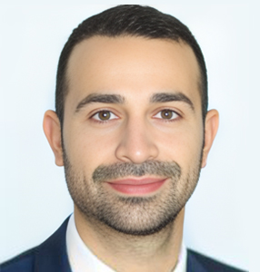 Professional headshot of man in dark blazer against white background for Ivy Institute website.